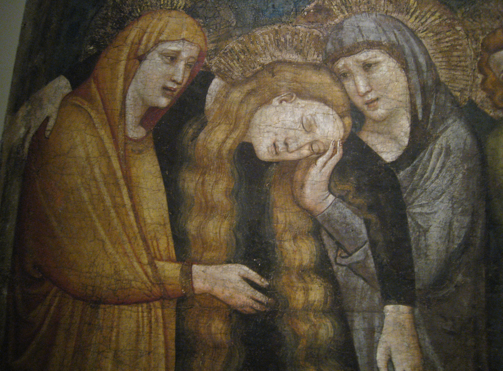 Ein abstraktes Gemälde mit leuchtenden Farben und kräftigen Pinselstrichen.