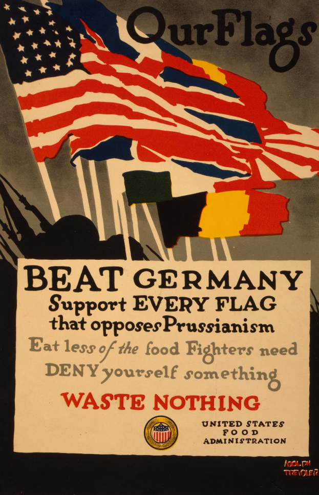 Ein Plakat mit einer roten, weißen und blauen Flagge mit einem weißen Stern, begleitet von fettem schwarzem Text, der "Unsere Flaggen schlagen Deutschland - Unterstützt jede Flagge, die gegen Preußentum kämpft" lautet, umgeben von einem weißen Rand.
