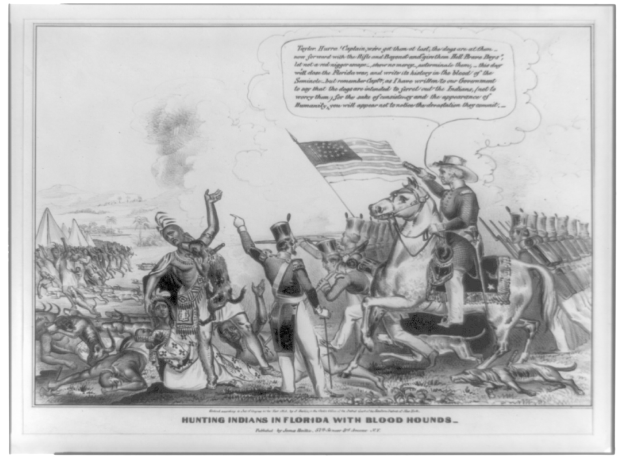 Schwarzes und weißes Foto einer Gruppe von Menschen, einige zu Pferd, mit einer Flagge im Hintergrund und dem Text "Jagen von Indianern in Florida mit Bluthunden" unten.