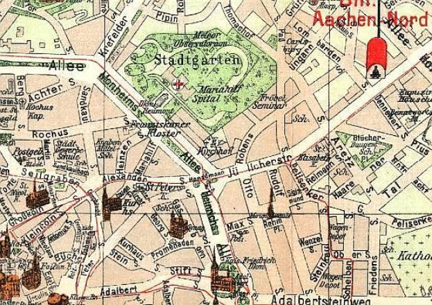 Ein detaillierter alter Stadtplan von Aachen, Deutschland, mit sichtbaren Sehenswürdigkeiten, Straßen und Merkmalen in Blauschattierungen, Grün und Gelb.