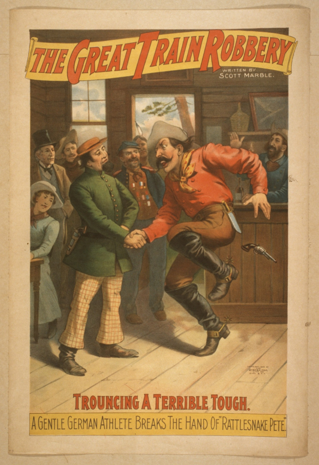 Ein Plakat, das eine Gruppe von Menschen auf einem Boden zeigt, einer hält eine Waffe, mit einem Fenster und einer Wand im Hintergrund und Text, der oben und unten "The Great Train Robbery - Trouching a Terrible Tough" liest.